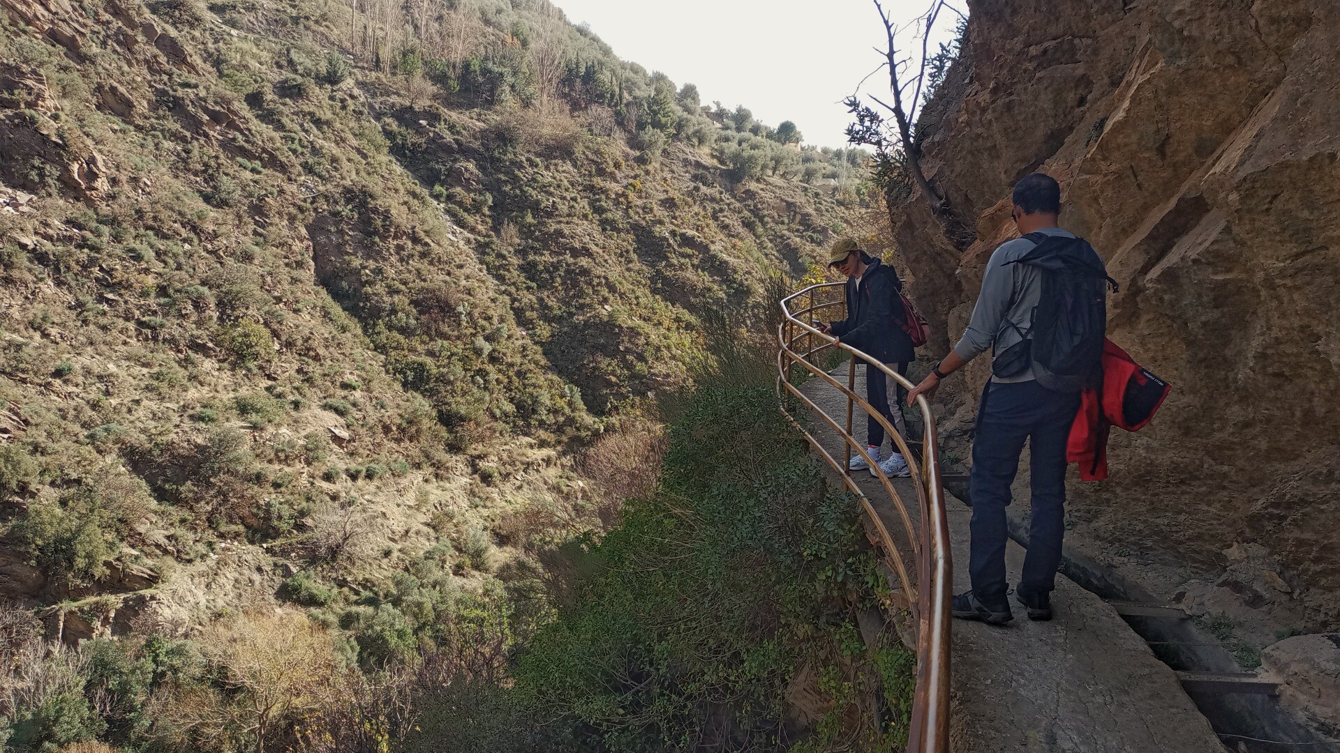On a high, narrow walkway above the Rio Lanjaron, Alpujarras