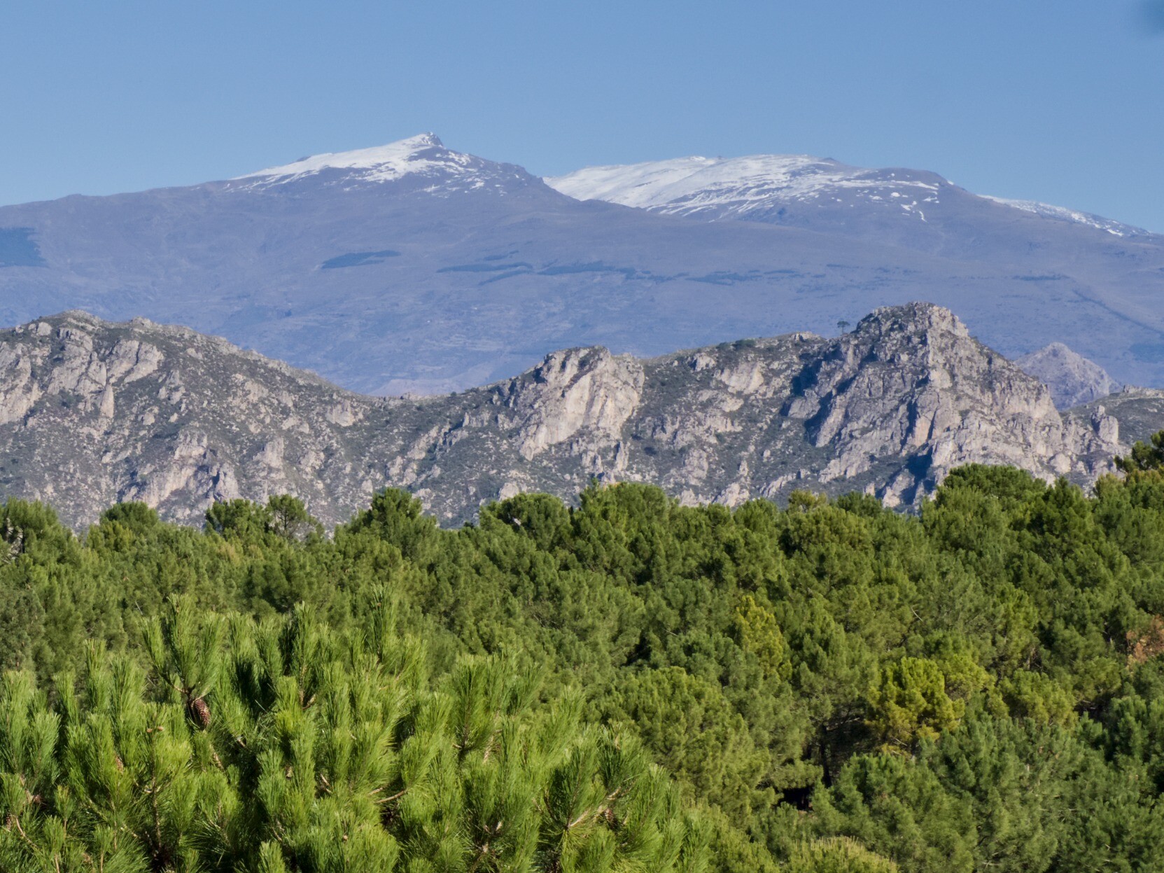 The south western aspect of the Spain's Sierra Nevada with Cerro de Caballo, Tajo de los Machos and Cerrillo Redondo with some snow cover. In a good winter this whole view would be a wall of white.