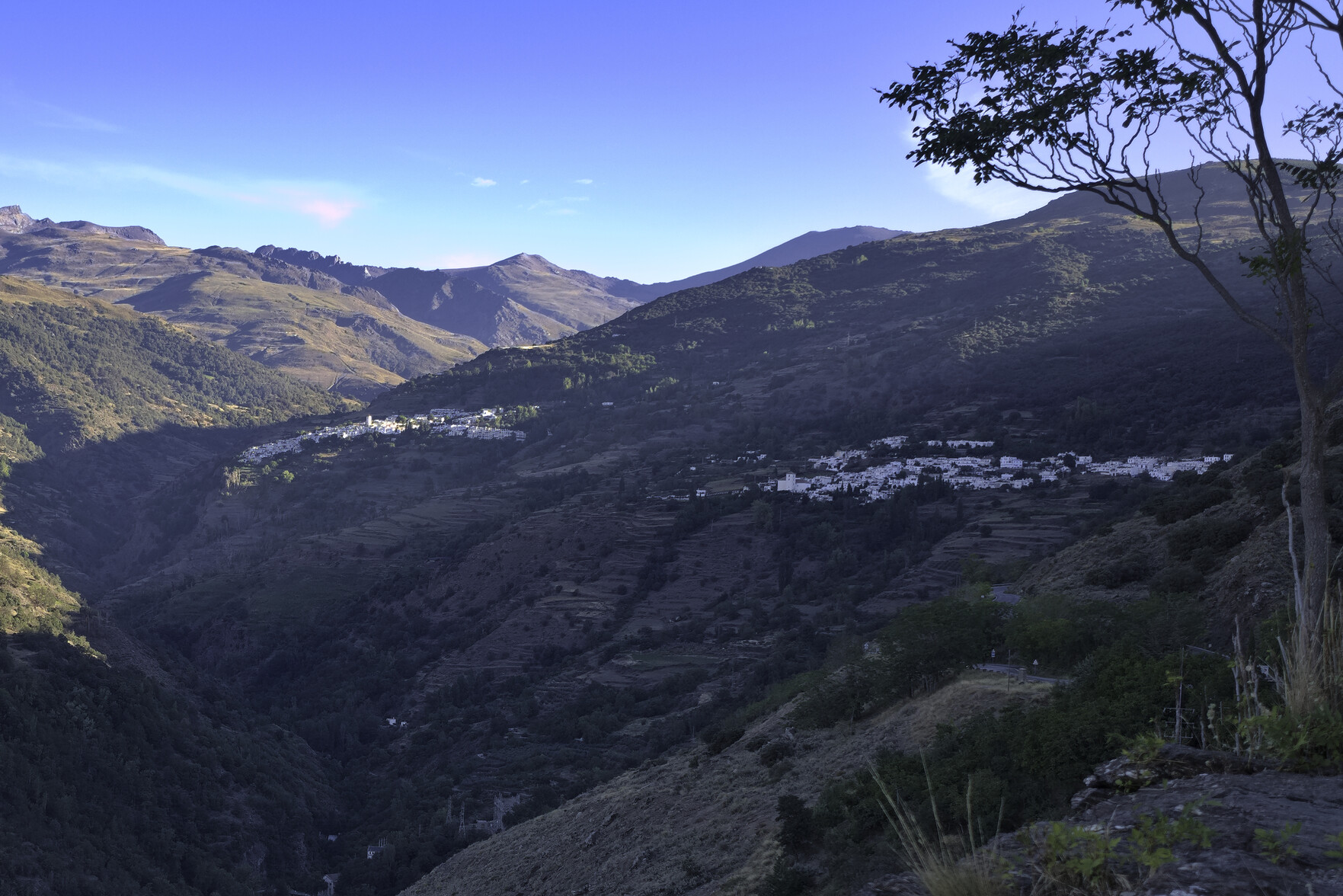The towns of Capileira and Bubion with the mountains of the main Sierra Nevada ridge line beyond.